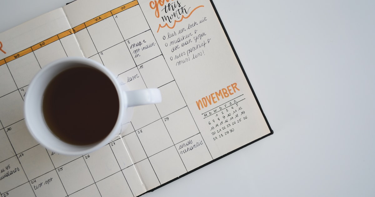 Calendar and planner open for quarterly financial planning