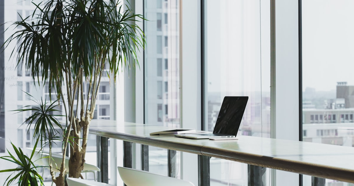 Person working independently at a modern office desk