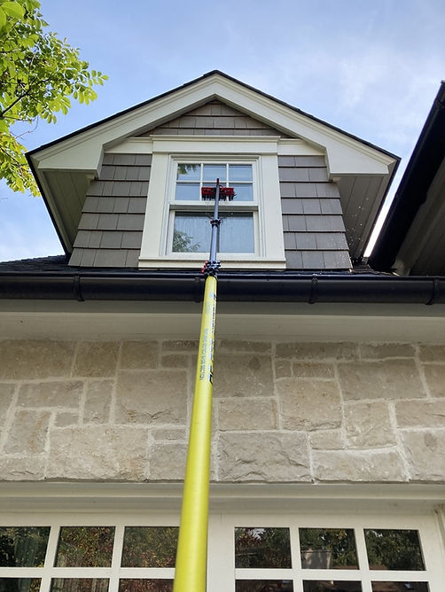 Professional window cleaning with deionized water system