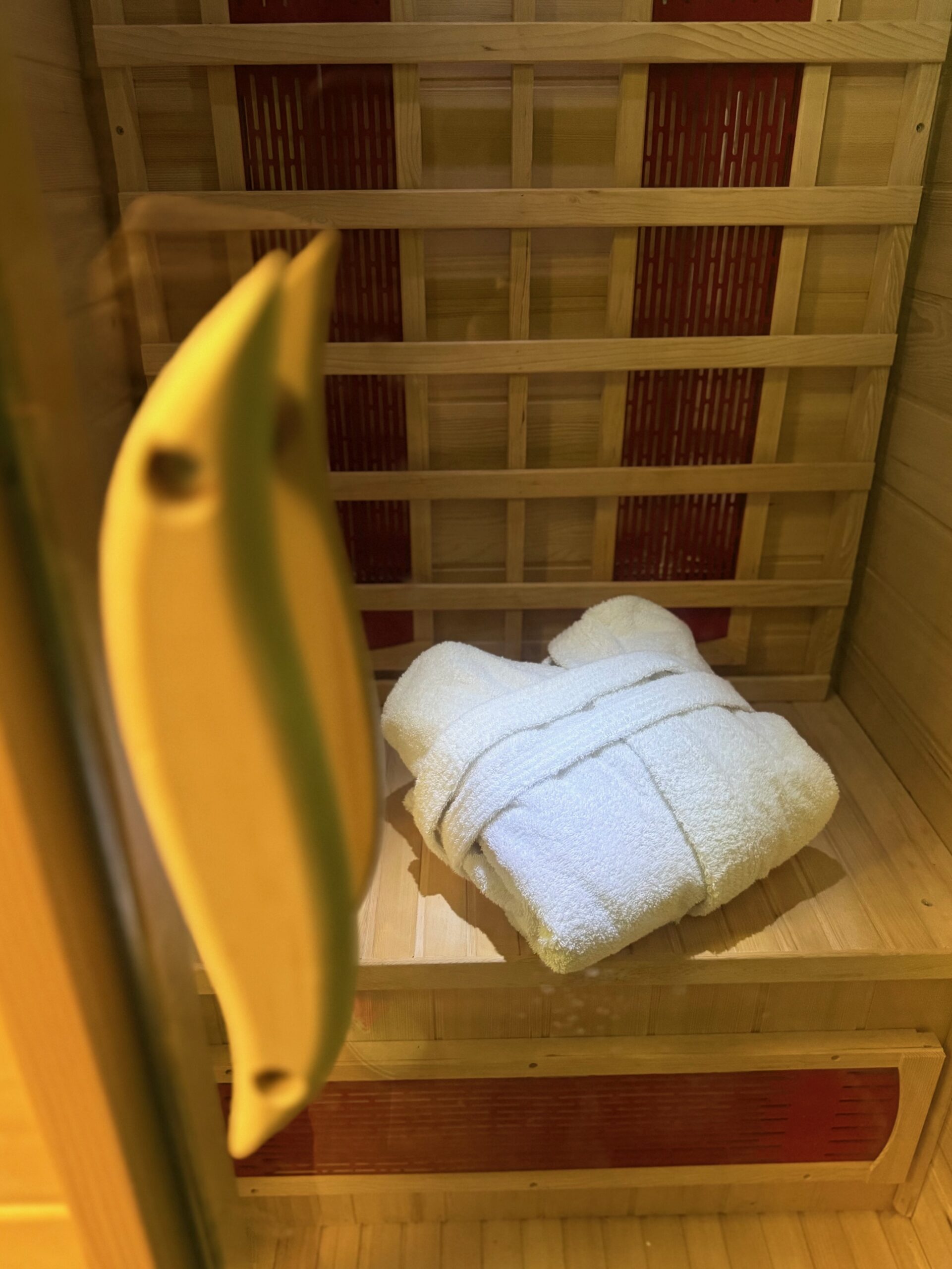 Private infrared sauna room ready for a session