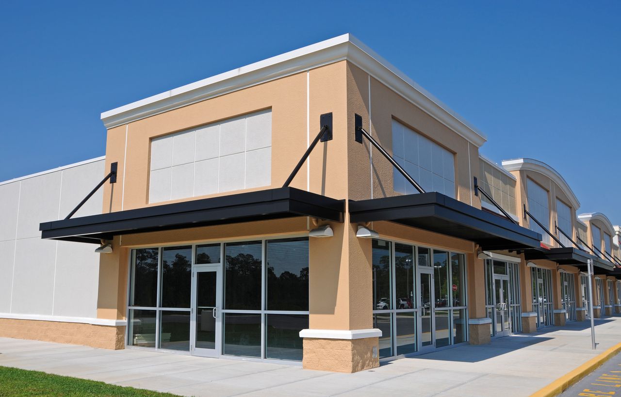 Commercial pressure washing of storefront and walkways