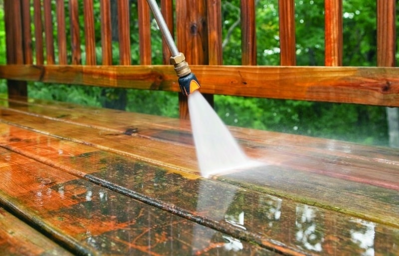 Cleaning a wood deck and patio with appropriate pressure