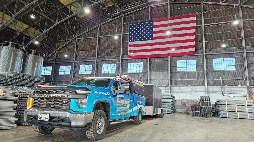 Lanz service truck with an American flag hanger on the job