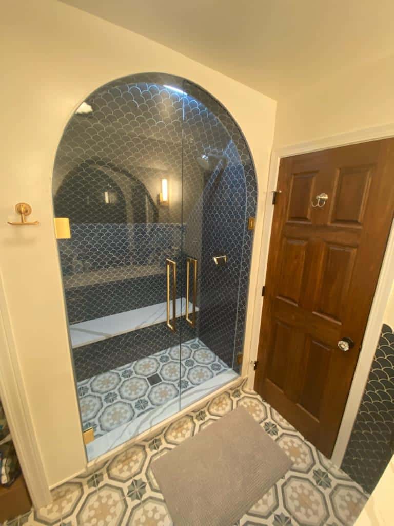 Custom glass shower doors in a modern bathroom
