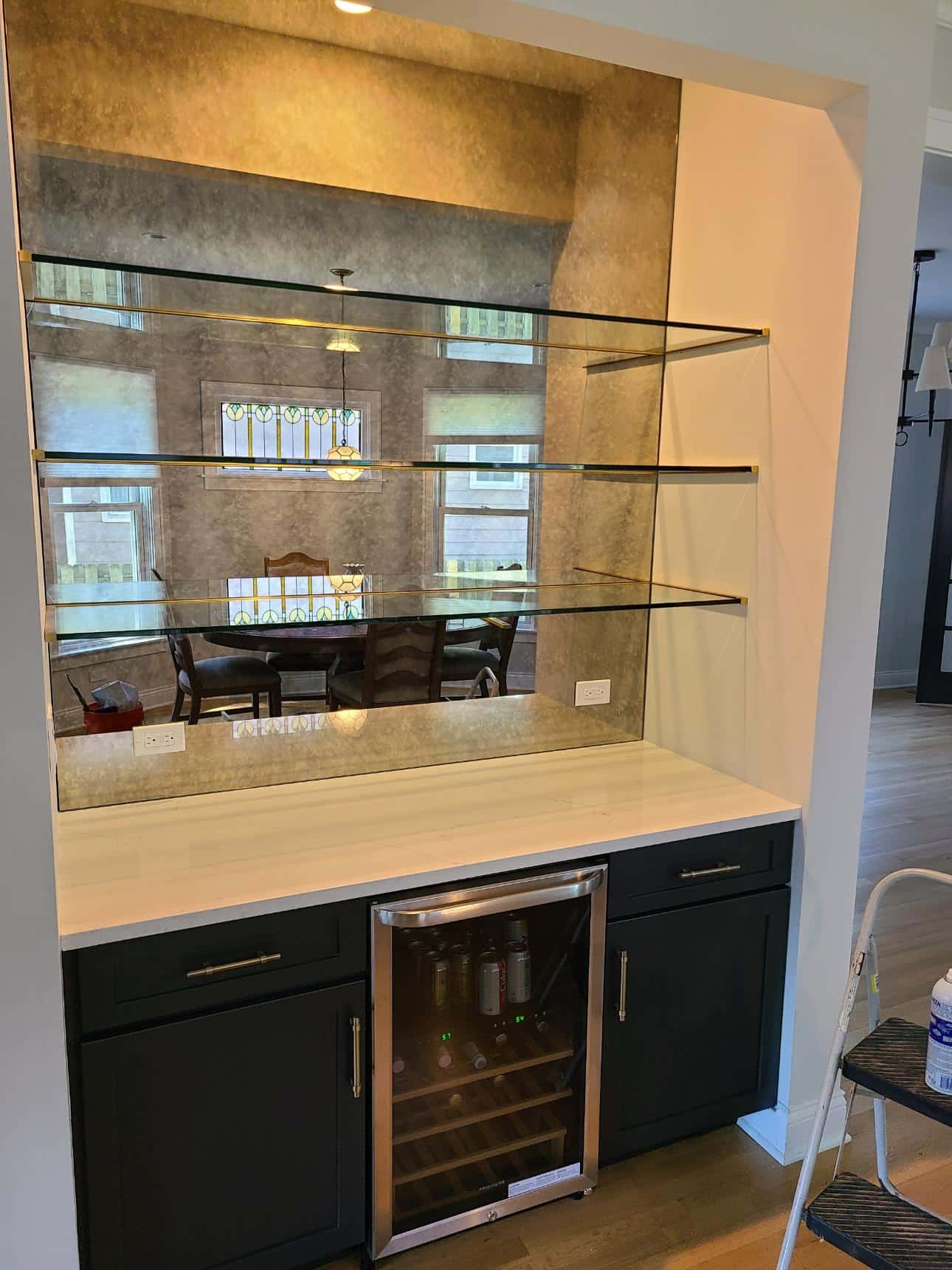 Custom glass shower with integrated shelves