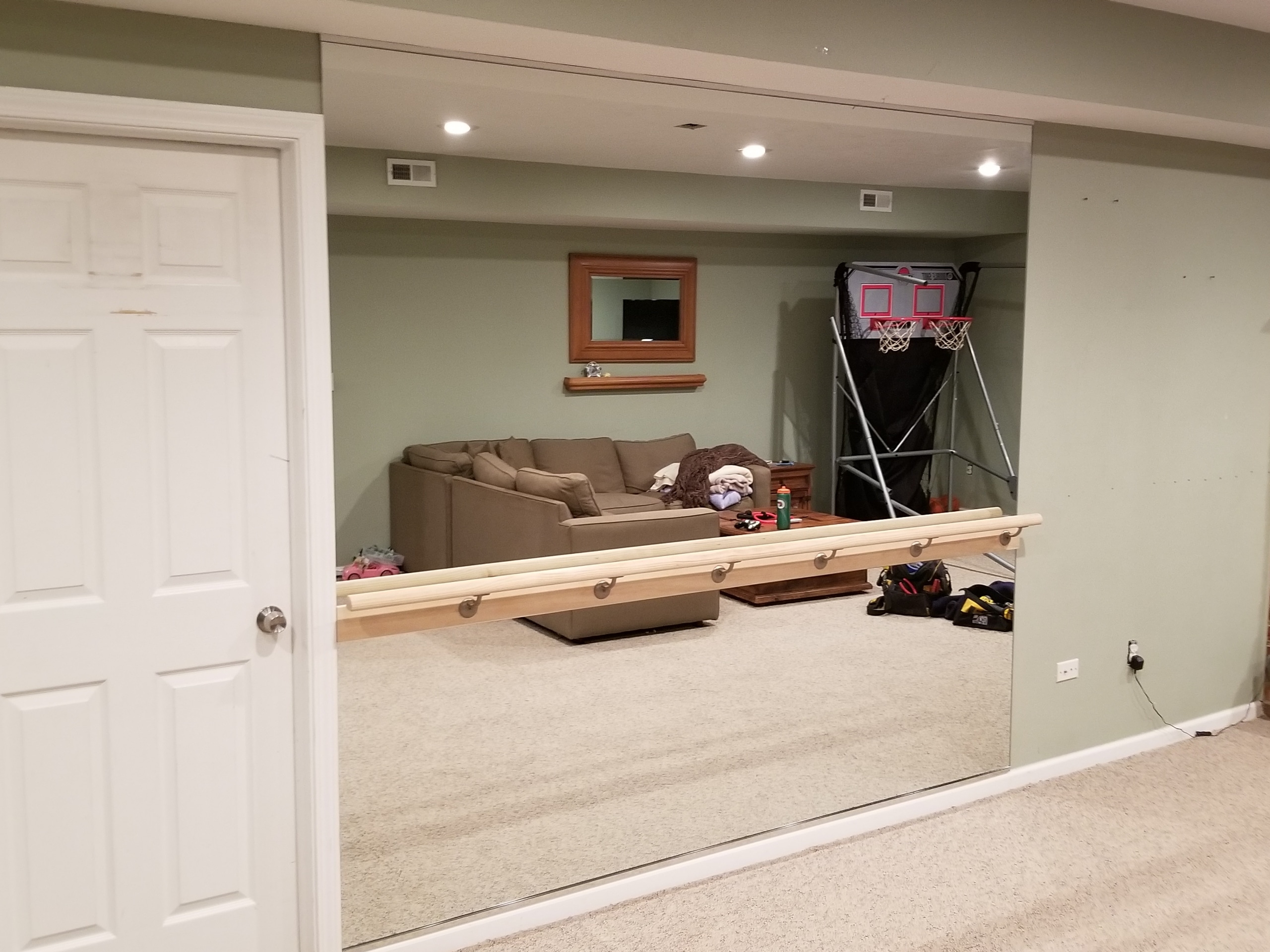 Full-wall dance studio mirror installation