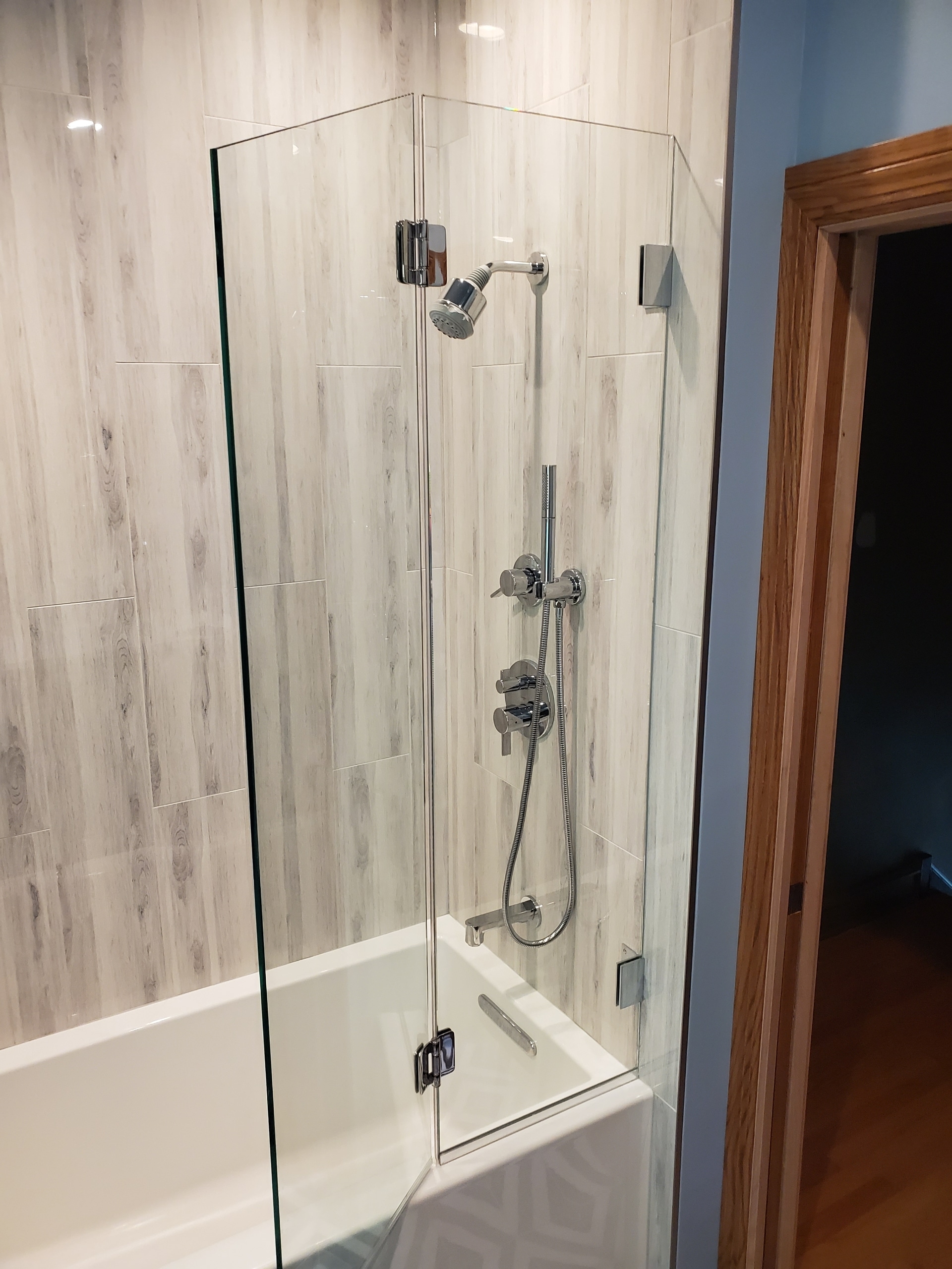Shower stall with glass enclosure